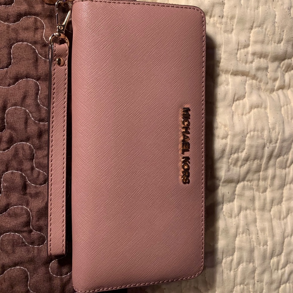 Light pink Michael kits wallet.